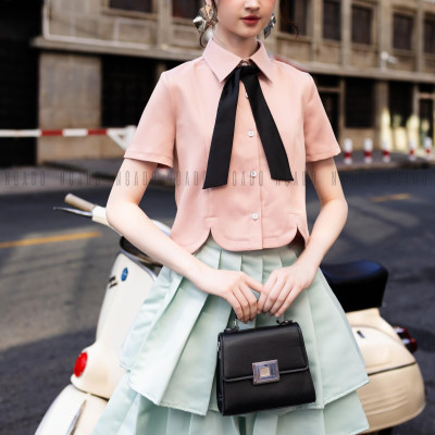 Chân váy xanh mint xếp ly NGADO