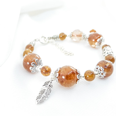 Vòng tay mệnh thổ, kim đá thạch anh tóc nấu mix charm chuồn chuồn+ chiếc lá