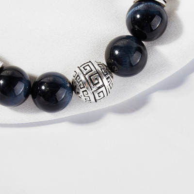 Vòng đá mặt trời đen phối charm bạc tròn hoa văn Ngọc Quý Gemstones