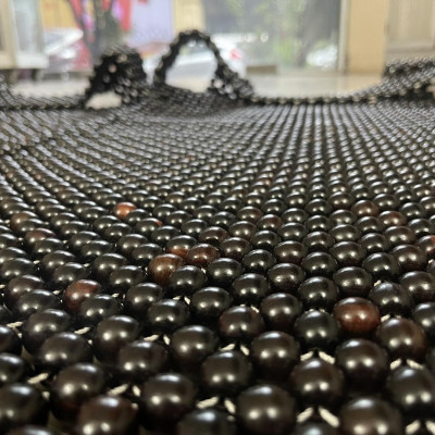 Lót ghế ô tô hạt gỗ trắc