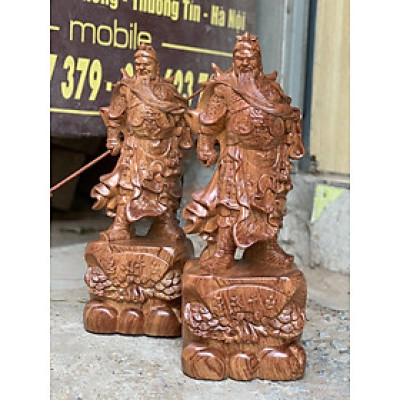 Tượng quan công cầm đao đứng trên gốc cây tùng kt cao 50